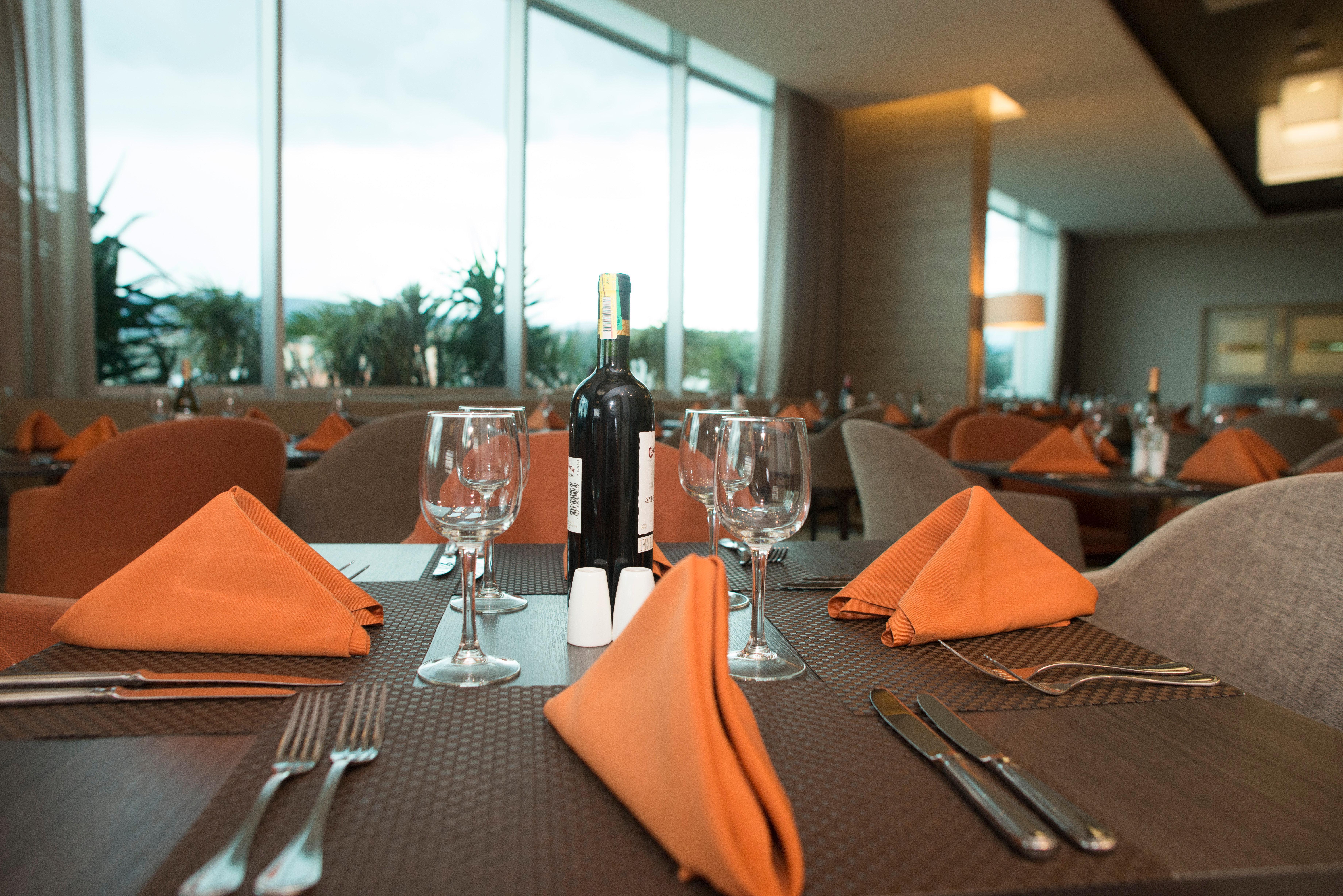 Holiday Inn Cucuta By Ihg Exteriör bild A table set for fine dining