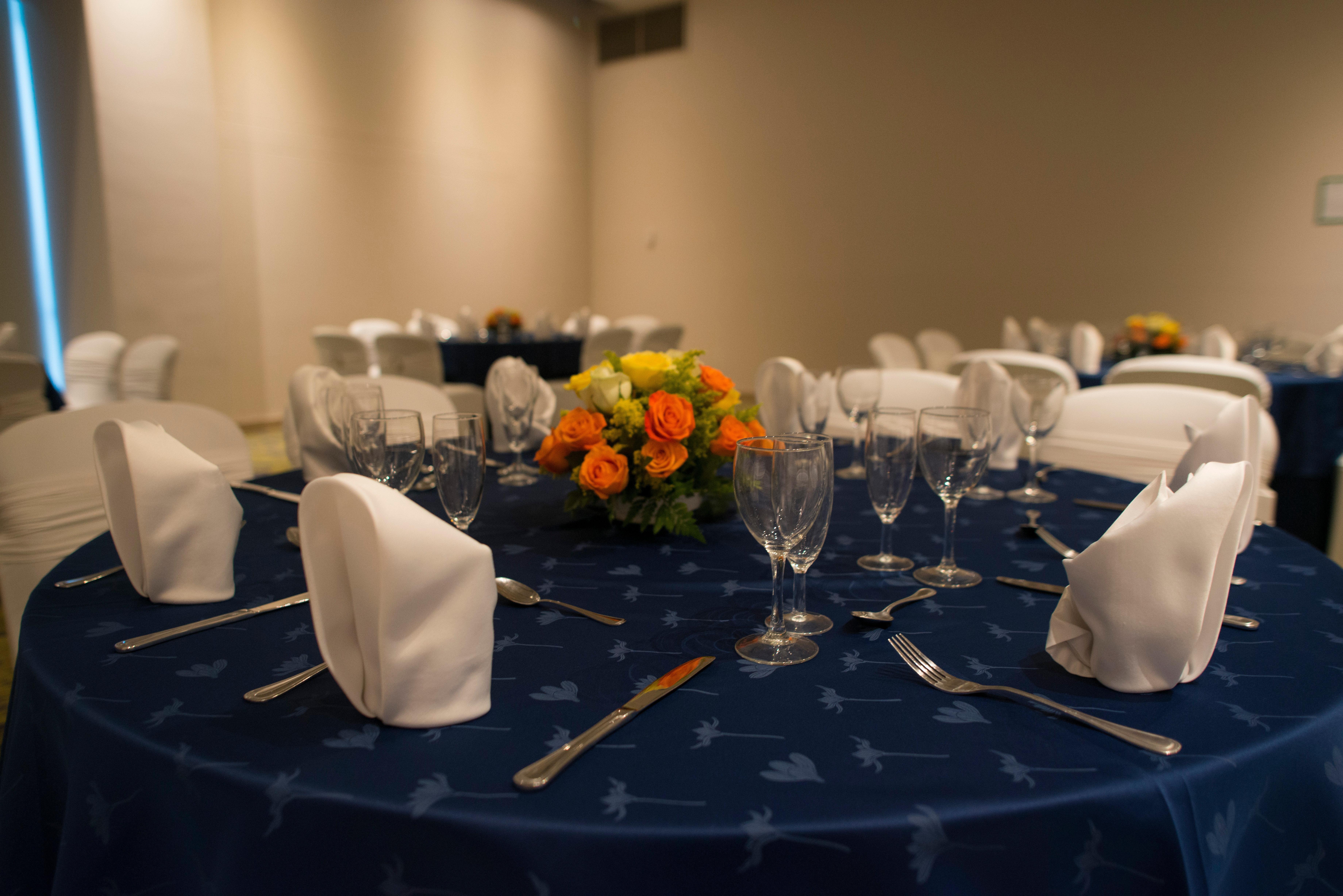 Holiday Inn Cucuta By Ihg Exteriör bild A table set for a formal dinner
